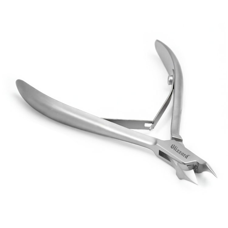 Metal nail clipper on a white background