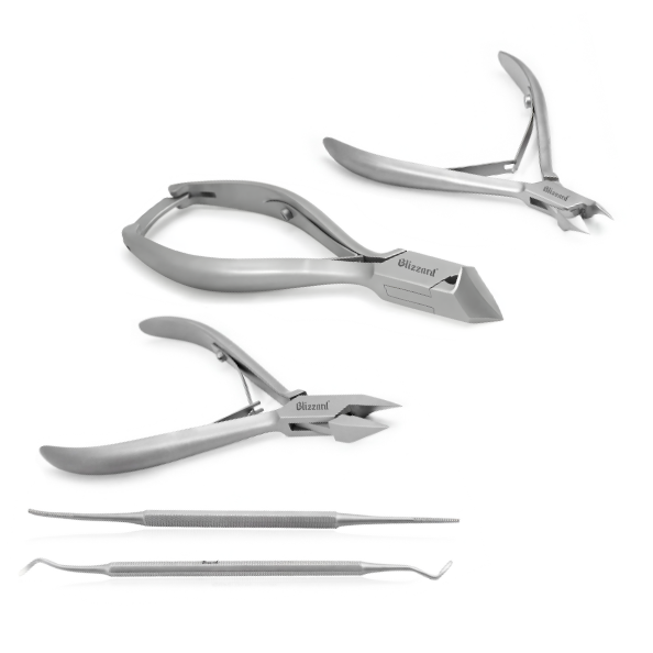 Set of silver nail clippers and cuticle nippers on a white background