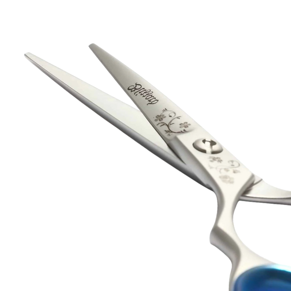 Close-up of a pair of scissors with a brand logo on a white background